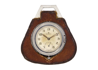 Lot 1115 - ROLEX - A rare La Girouette reversible travel pocket watch within a nickel case with leather cover.