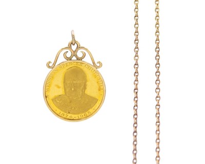 Lot 90 - A 22k gold Churchill medal pendant with a 9k gold cable chain.