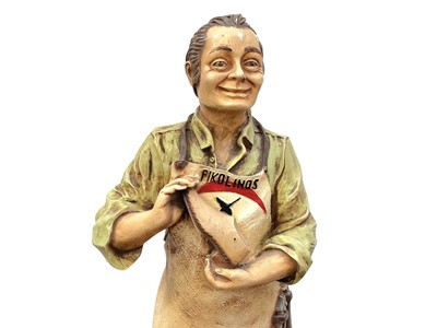 Lot 7 - A resin Pikolinos advertising figure of a cobbler.