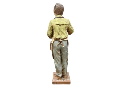 Lot 7 - A resin Pikolinos advertising figure of a cobbler.