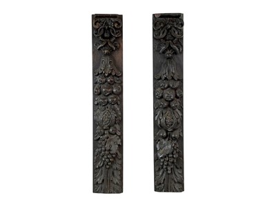 Lot 89 - Two similar carved oak panels.