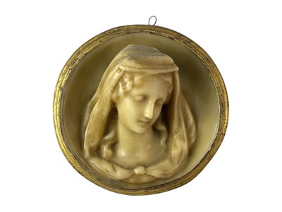 Lot 2 - A circular wax relief portrait of the Virgin Mary.