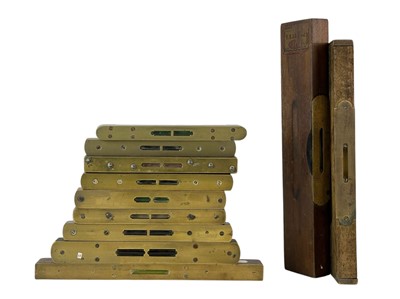 Lot 152 - A collection of wood and brass spirit levels.