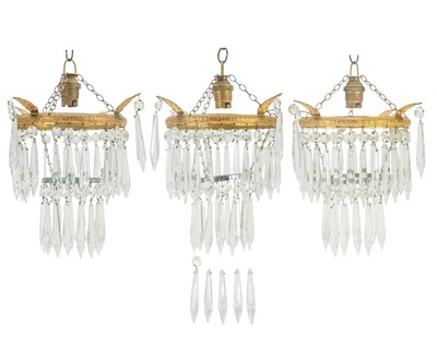 Lot 491 - Three brass and cut glass two-tier chandeliers.