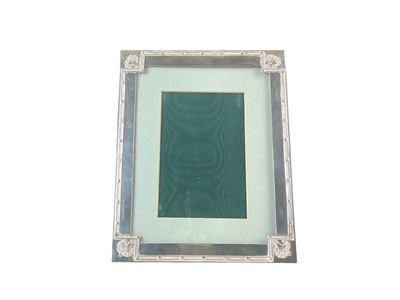Lot 254 - An Edwardian silver rectangular easel photograph frame.