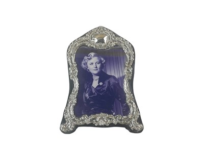 Lot 245 - A silver rectangular easel photograph frame, of Rococo design.
