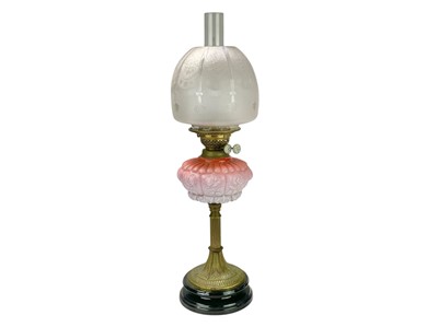 Lot 492 - A Duplex pink ombre glass oil lamp.