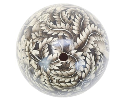 Lot 25 - A decorative Balinese painted ostrich egg.