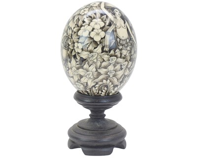 Lot 25 - A decorative Balinese painted ostrich egg.