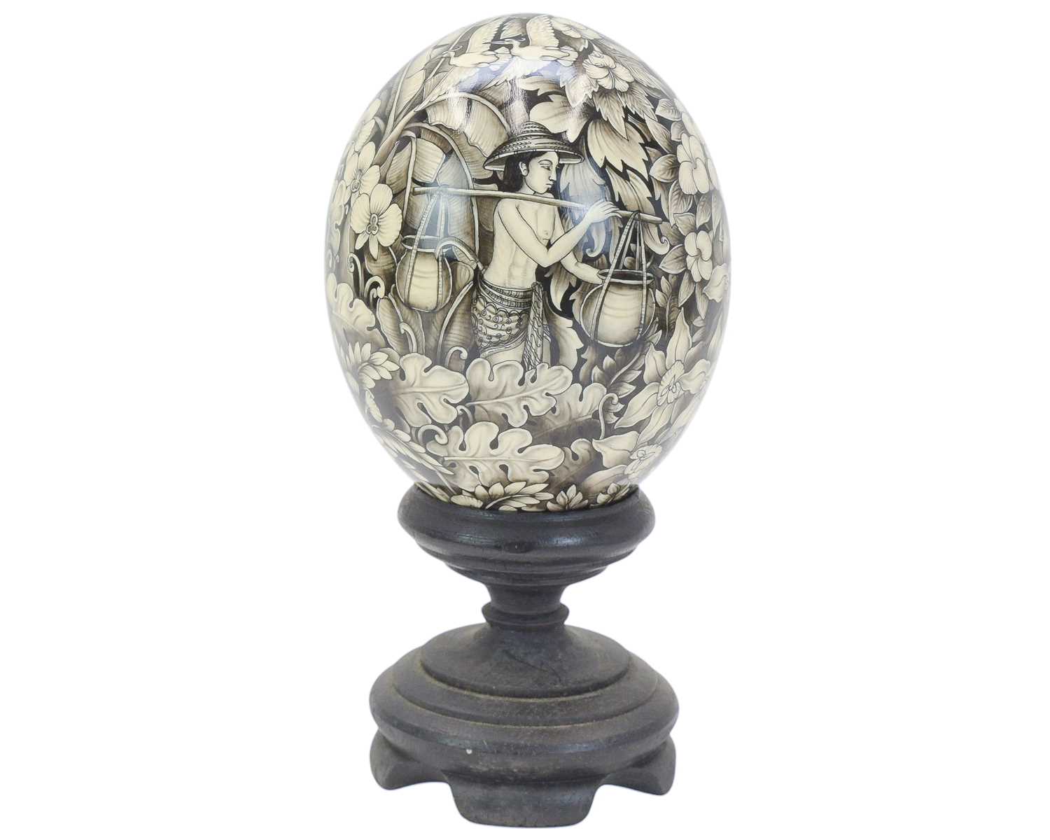 Lot 25 - A decorative Balinese painted ostrich egg.