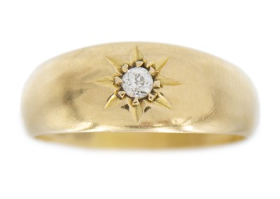 Lot 154 - An 18k gold diamond set gypsy-style ring.