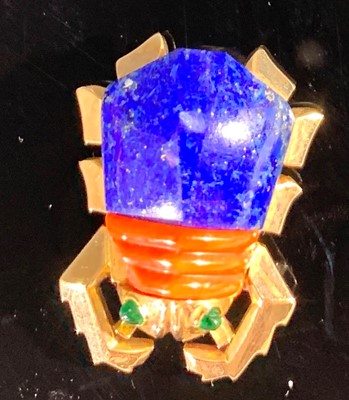 Lot 2595 - A Cartier beetle brooch, the abdomen in lapis...