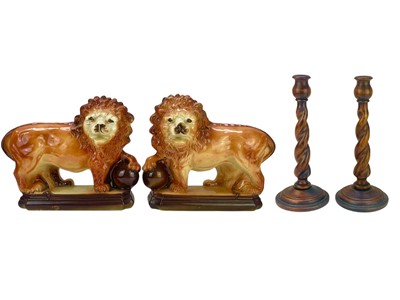Lot 320 - A pair of Staffordshire pottery 'Medici' lions.