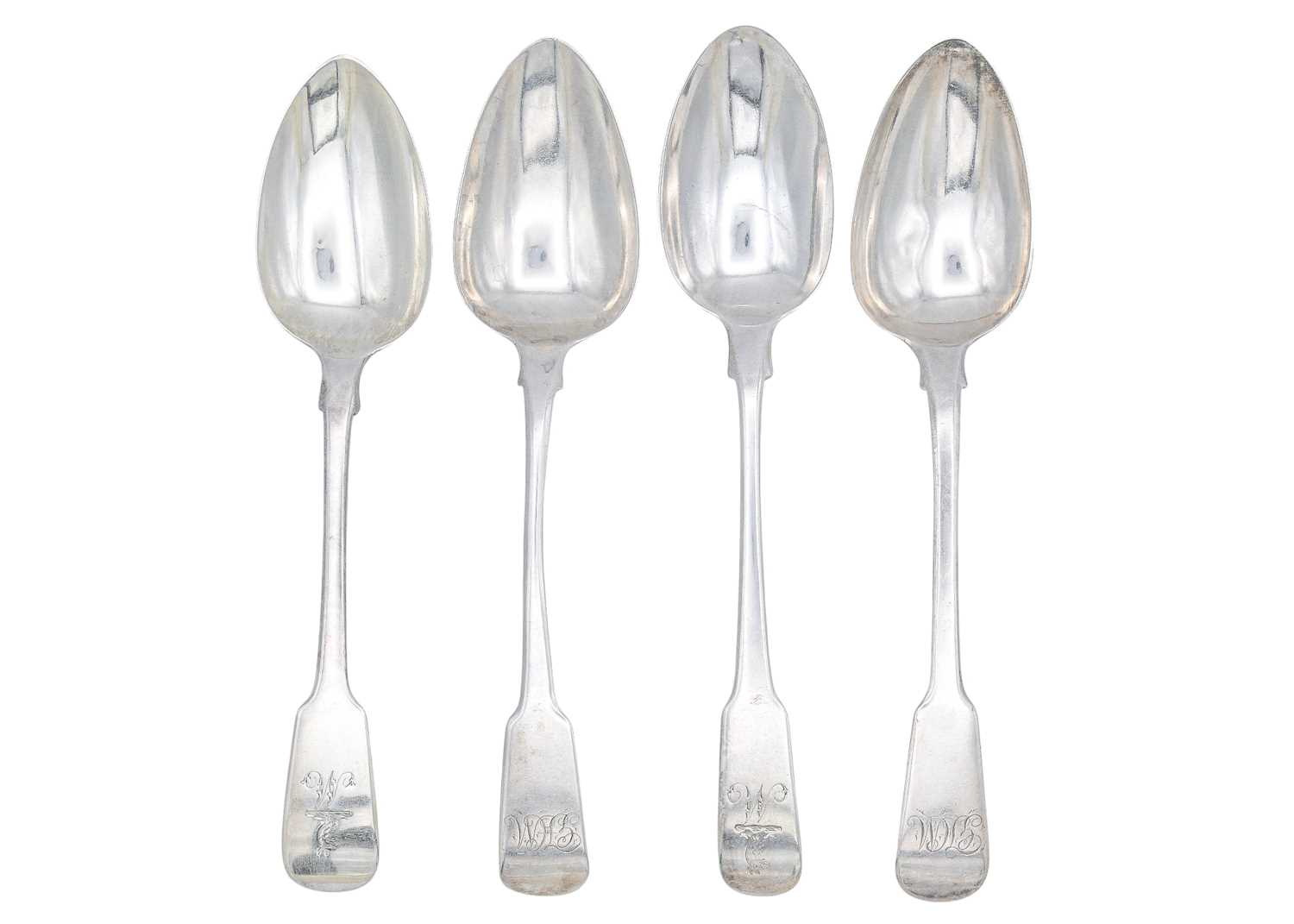Lot 4 - A selection of four 19th-century silver fiddle pattern table spoons.