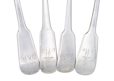 Lot 4 - A selection of four 19th-century silver fiddle pattern table spoons.