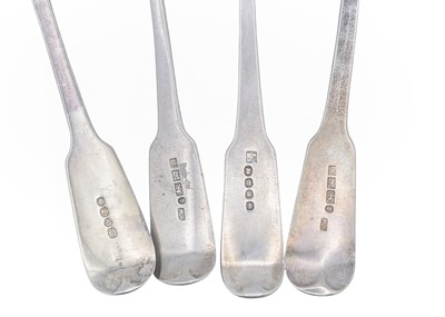 Lot 4 - A selection of four 19th-century silver fiddle pattern table spoons.