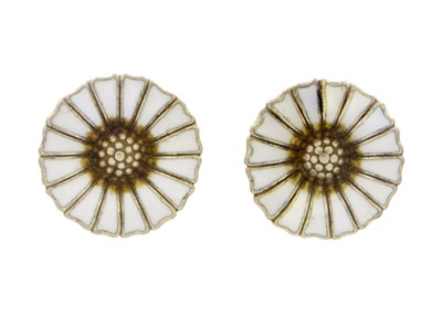 Lot 157 - A pair of silver gilt and white enamel daisy stud earrings by Danish modernist GEORG JENSEN.