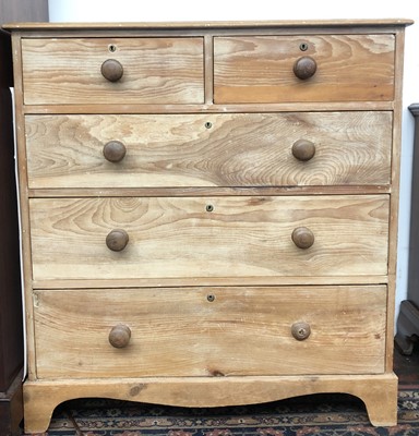 Lot 3235 - A pine chest of drawers, with two short and...