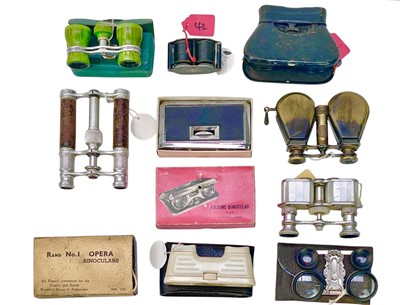 Lot 61 - Folding binoculars and opera glasses.