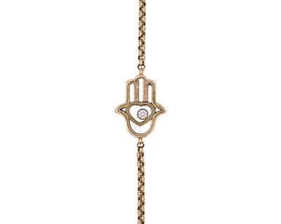 Lot 178 - CHOPARD - A 'Happy Diamonds' hand motif 18k gold bracelet set with a diamond.
