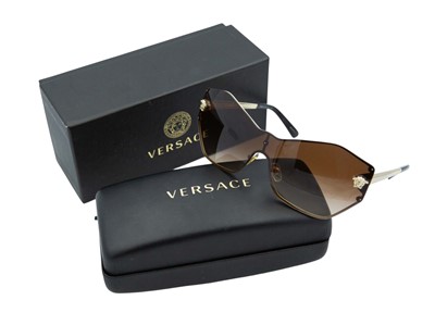 Lot 211 - VERSACE - A pair of lady's sunglasses with original case and box.