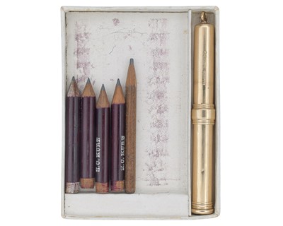 Lot 1144 - A 9k propelling pencil fob by Goldsmiths & Silversmiths Co Ltd, within original box.