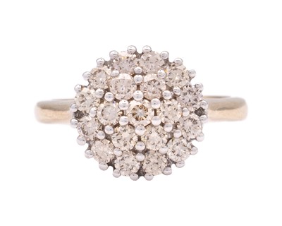 Lot 107 - A 9k yellow gold and diamond cluster ring.