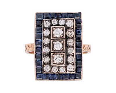 Lot 109 - An Art Deco style rose gold diamond and sapphire set dress ring.