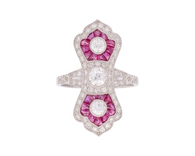 Lot 112 - An Edwardian-style diamond and ruby set in platinum ring.