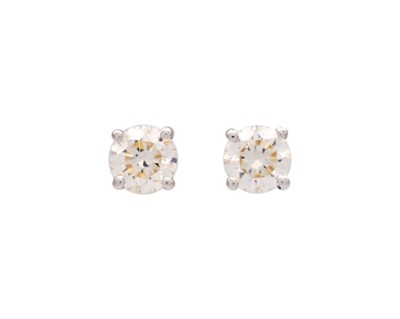 Lot 122 - A pair of 18k yellow gold diamond stud earrings.