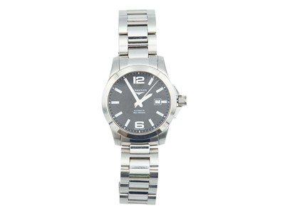 Lot 1086 - LONGINES - A Conquest stainless steel automatic gentleman's bracelet wristwatch.