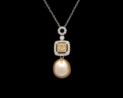 Lot 126 - An 18k gold pendant set with cultured golden pearl with yellow and white diamonds on a chain.