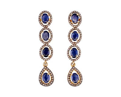 Lot 128 - A pair of silver gilt sapphire and diamond set pendant drop earrings.
