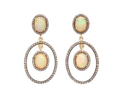Lot 135 - A pair of silver gilt opal and diamond set pendant earrings.