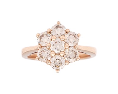 Lot 187 - An 18k rose gold diamond cluster ring.