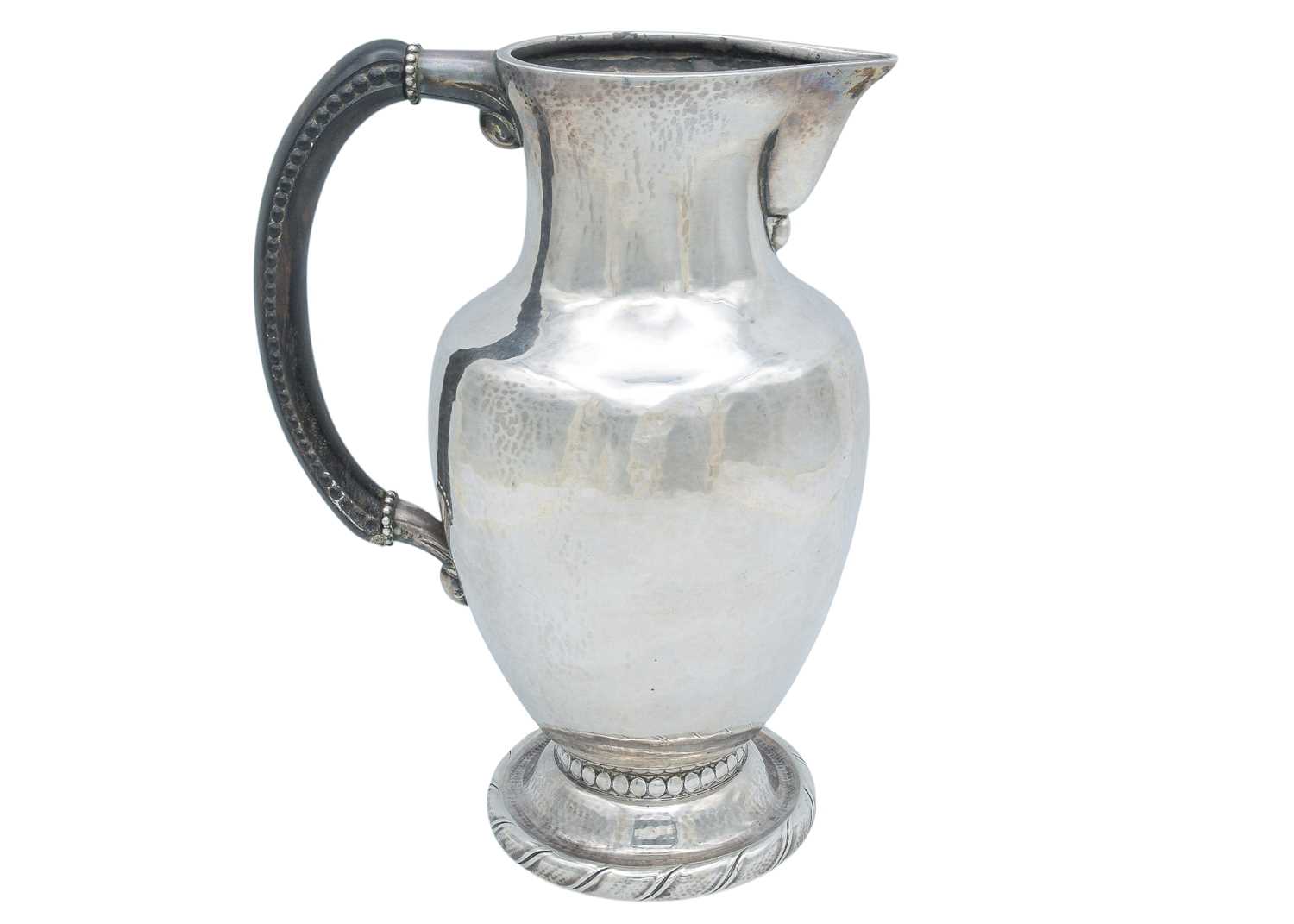 Lot 5 - GEORG JENSEN - A rare early 20th century silver pitcher, no. 5A.