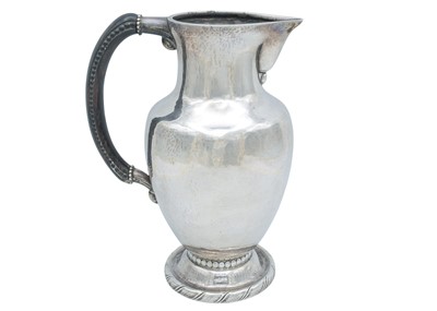 Lot 5 - GEORG JENSEN - A rare early 20th century silver pitcher, no. 5A.