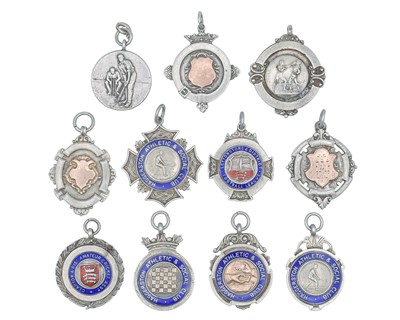 Lot 1150 - A collection of eleven silver pocket watch fobs.
