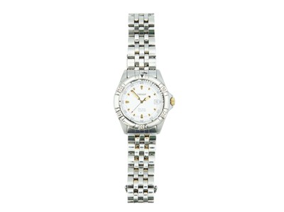 Lot 1092 - TISSOT - A PR 100 stainless steel gentleman's quartz bracelet wristwatch.