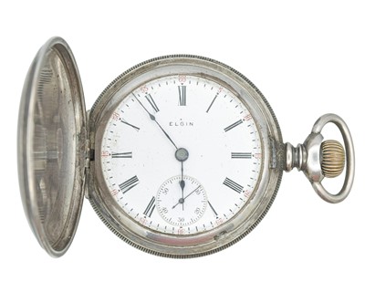 Lot 1134 - ELGIN - A sterling silver cased keyless wind full hunter lever pocket watch.