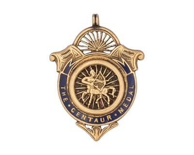 Lot 200 - A 9k rose gold 'The Centaur Medal' shield fob.