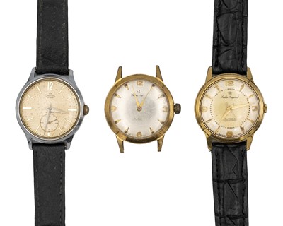 Lot 1196 - SMITHS - Two Imperial gold-plated gentleman's manual wristwatches and a De Luxe stainless steel watch.