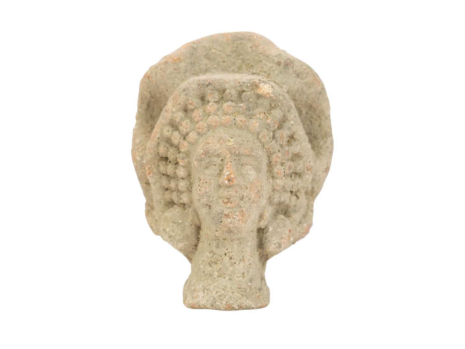 Lot 5 - A Greco-Roman clay head of a woman.