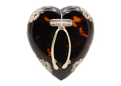 Lot 117 - A Victorian silver-mounted tortoiseshell heart-shaped desk letter clip by Henry Atkins.