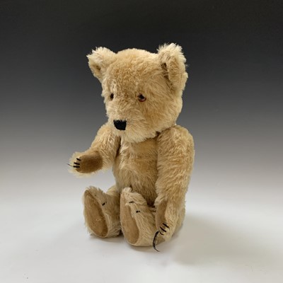 Lot 606 - A Chiltern Toys golden plush Teddy bear,...