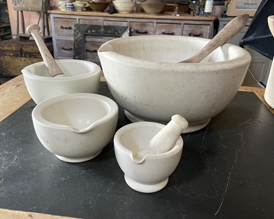 Lot 30 - A large white stoneware pestle and mortar.