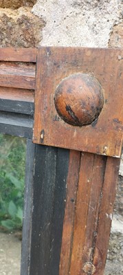 Lot 42 - A pine framed wall mirror.
