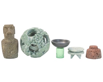 Lot 561 - A Chinese hardstone puzzle ball on a stand.