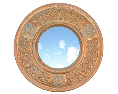 Lot 7A - Francis 'Bert' Cargeeg, a rare hand wrought circular copper wall mirror.