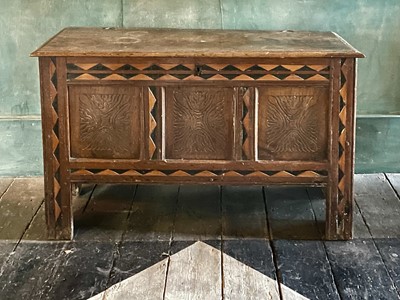 Lot 50 - An oak and inlaid three panel coffer.